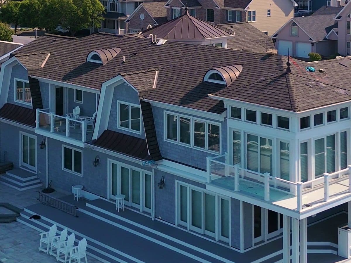 A completed A&J shingle roof on a waterfront home in Central New Jersey