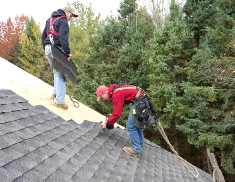 Team working on a roof installation