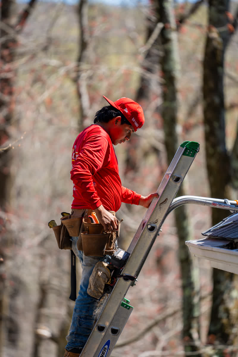 A&J crew working near the gutter line