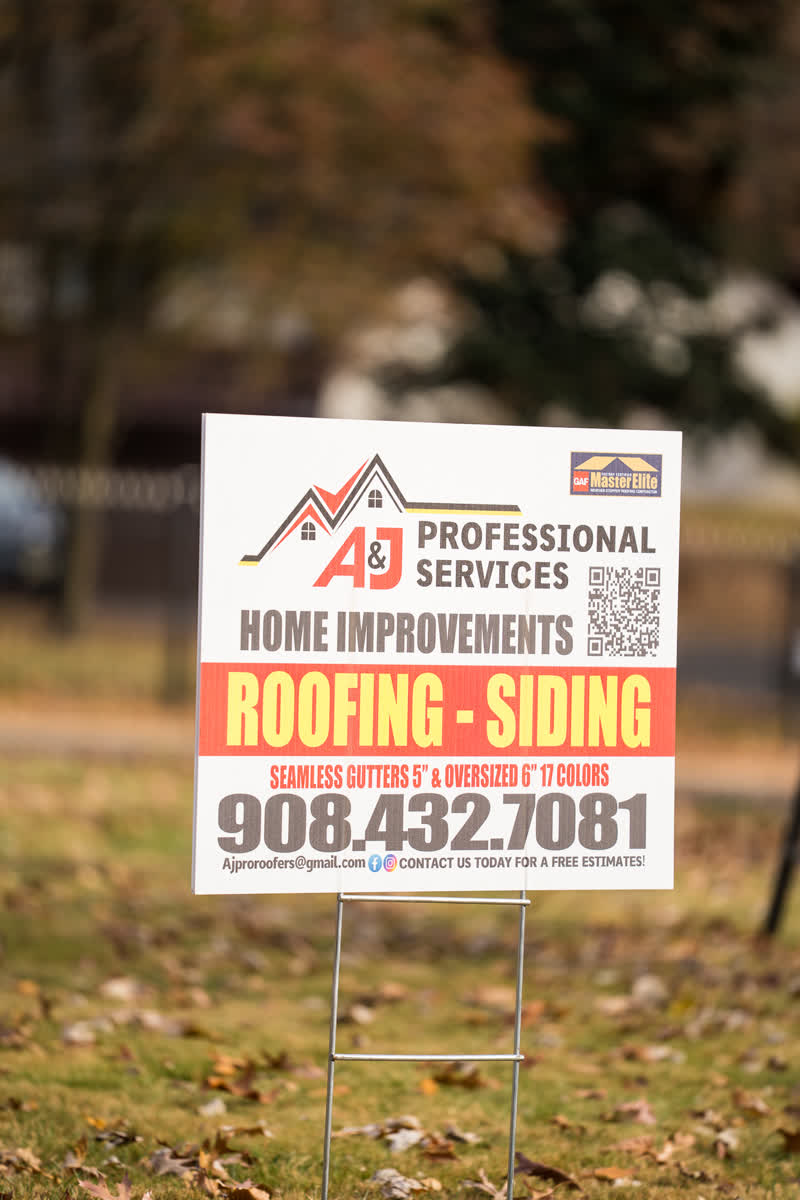 A&J Professional Services sign with GAF Master Elite badge